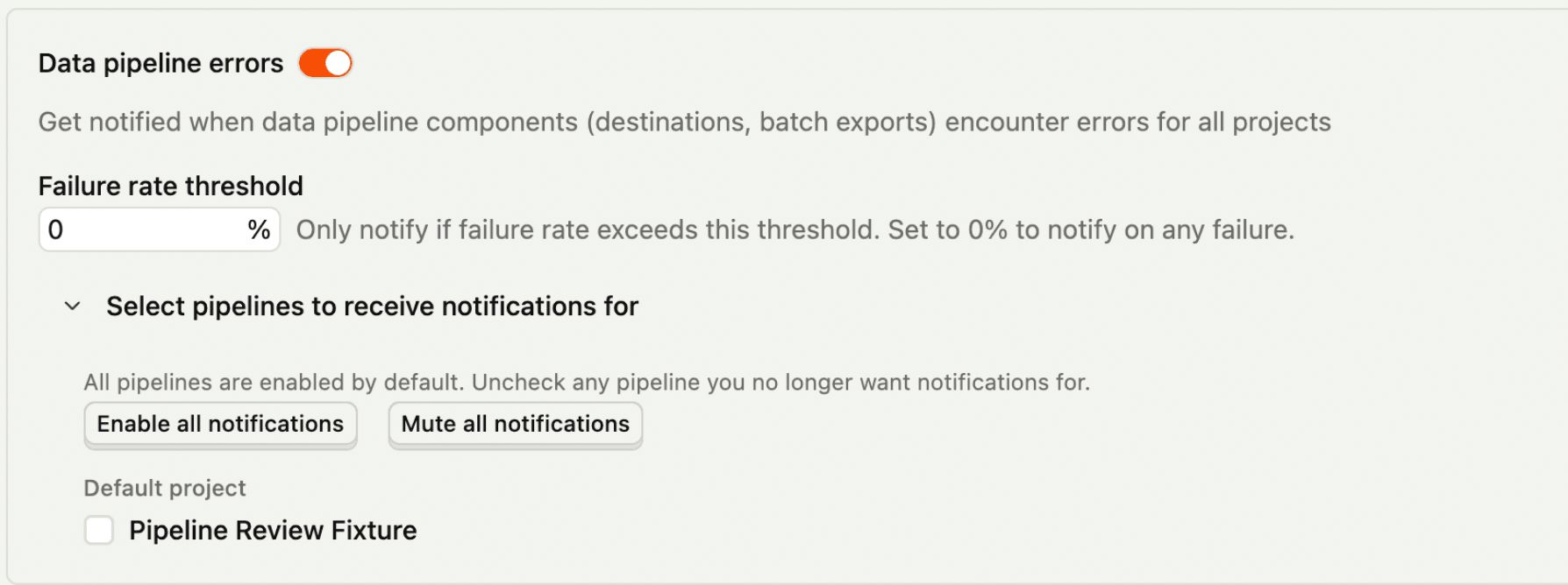 PostHog notification settings for data pipeline errors with a failure-rate threshold and per-pipeline selection controls